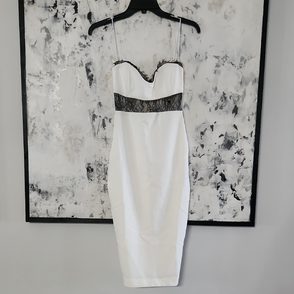 Elegant White Lace-Trimmed Dress